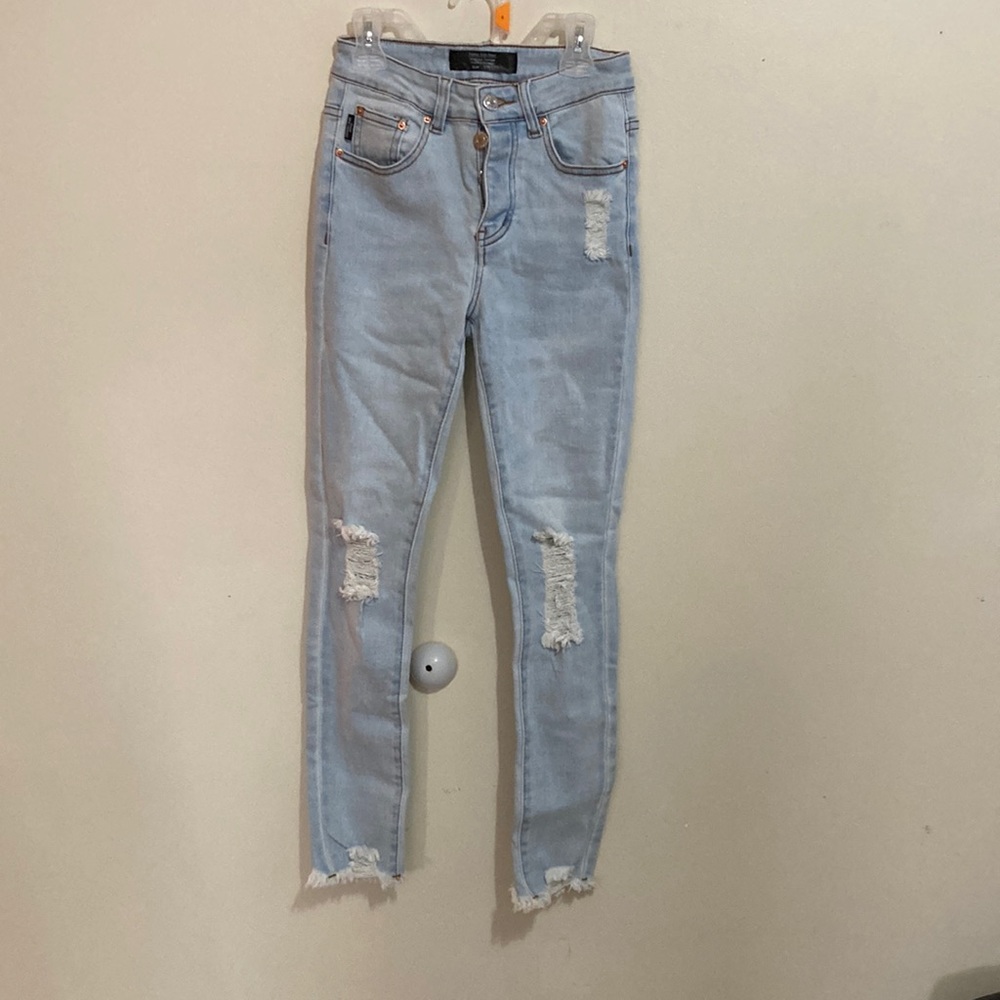 Light blue distressed jeans